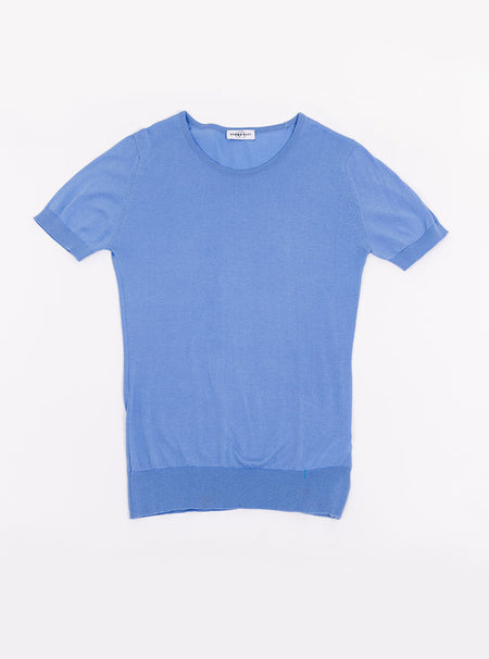 Flat lay of women's cornflower blue short sleeved knit top in a luxury and premium sea island cotton.